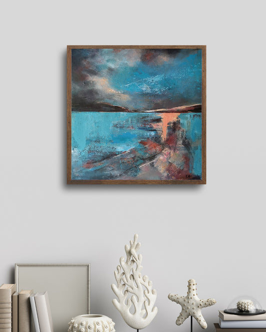 A framed fine art print titled 'Echoes of Light' by Kari Herbert, featuring a vibrant waterside scene with abstract elements and a color palette that includes turquoise, pinks, peaches, and burnt oranges, hung on a wall with decorative items.